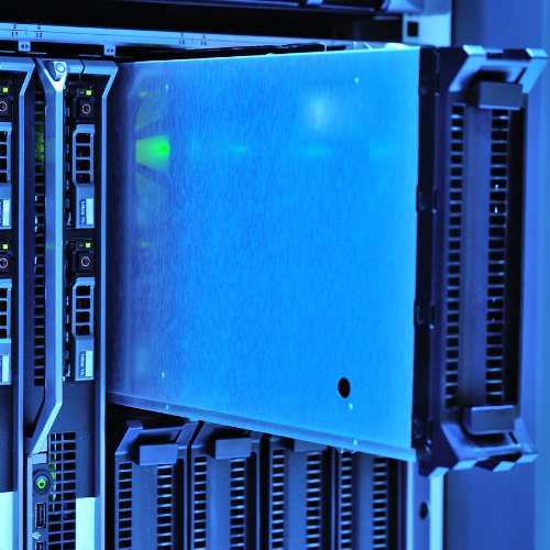 Hard drive being removed from a computer prior to secure destruction.